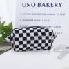 Soft Woven Checkered Toiletry Bag
